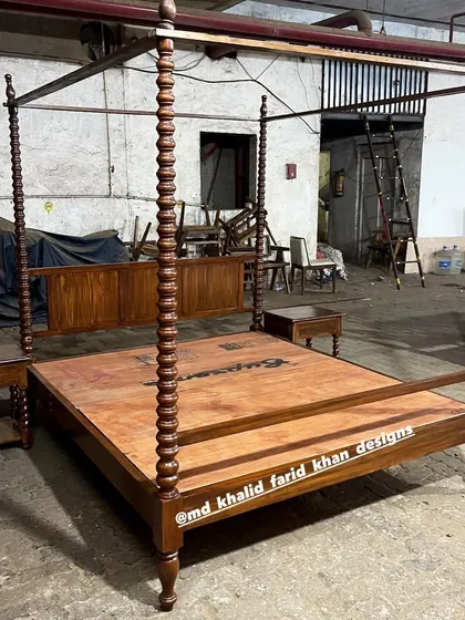 A colonial-style four-poster bed with intricately turned posts, crafted for a project in Panchgani. This design is all about classic elegance and is built from solid teak to last a lifetime.