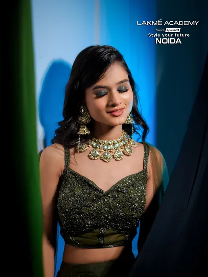 A close-up on a green smokey eye. This look is perfect for festive occasions and pairs beautifully with traditional Indian wear.