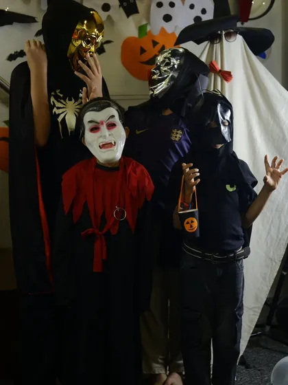 The spooky squad assembles! Students in their Halloween costumes, ready for a night of fun jams and trick-or-treating at the music school.