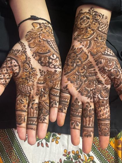 Intricate Full Hand Mehendi photo 8