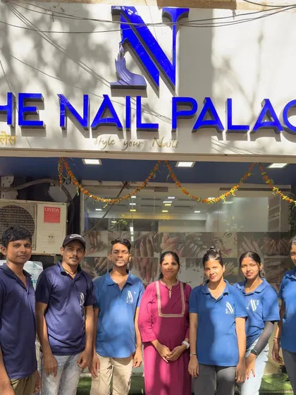 A group photo of my incredible team outside the salon. We are all passionate about what we do and are ready to welcome you for your own royal treatment.