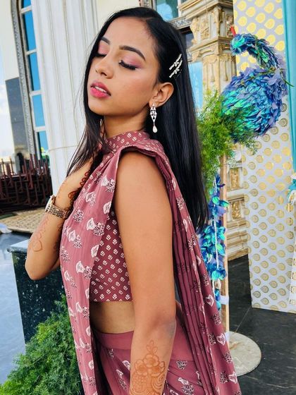 The lighting in this shot highlights the subtle glow on her skin, a key part of the natural yet glam look we were aiming for.