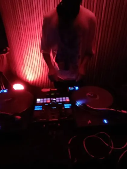 Another angle from my 90's hip hop set at Social. The setup with two turntables and a mixer is my command center for creating a vibe and taking the crowd on a journey through different sounds.