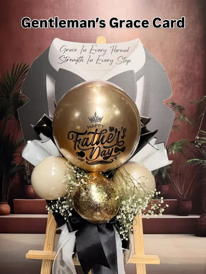 A full view of the "Gentleman's Grace Card" on its display easel. The black, white, and gold color scheme creates a timeless and elegant tribute to Dad.