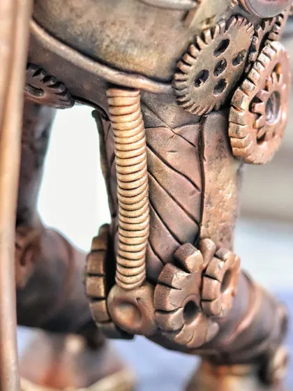 Close-up on the intricate piping and gear details on the leg joints of the Steampunk Horse cake.
