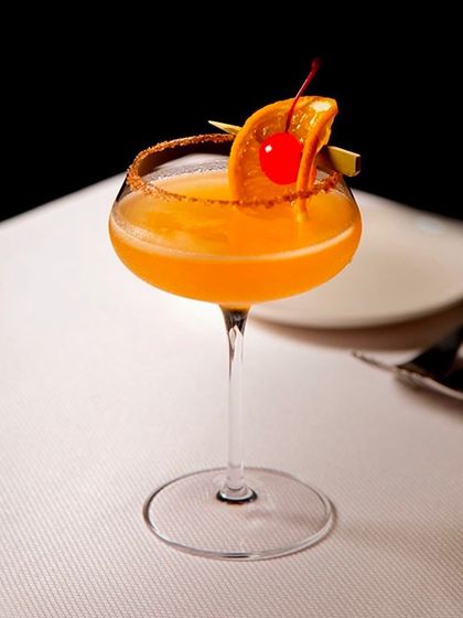 We also honor the classics. Our Sidecar is crafted with traditional precision, blending fine cognac, orange liqueur, and fresh lemon juice. It is a timeless cocktail, perfectly balanced and served with a sugared rim.