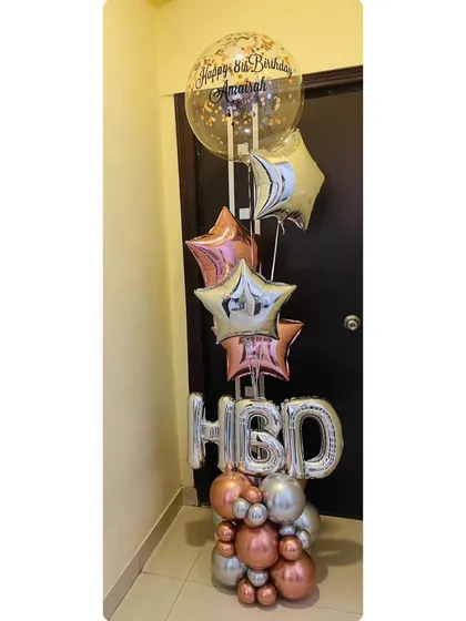 A taller version of our 'HBD' bouquet, featuring star-shaped foil balloons and a personalized bubble balloon for an extra festive touch. We can customize the height and elements for you.