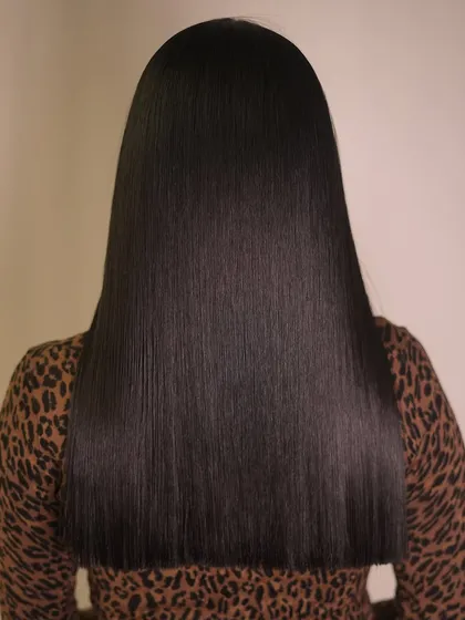 The result of our Cysteine smoothing treatment. This formaldehyde-free formula tames frizz and adds incredible shine and softness, leaving hair sleek, healthy, and manageable without compromising its integrity.