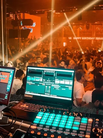 This is my view from the DJ booth at a packed night in Kolkata. My goal is to connect with the crowd and create a non-stop energy wave, and this image captures that moment perfectly.