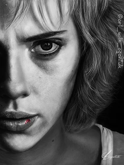 Another version of my portrait of Lucy, with a single touch of red color on her lip. This selective color technique in a black and white image helps to draw the viewer's eye and add a focal point to the story.