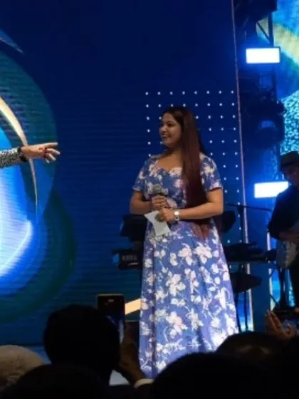 A different angle of my interaction with Shaan, capturing the grand stage setup.