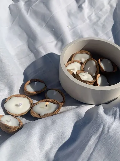 We made these cute little walnut shell candles for a customized order. We can create custom designs for orders as low as 50 pieces.