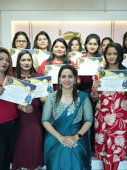 A group photo with another successful cosmetology batch. Seeing them all certified and ready for the industry is my greatest reward.