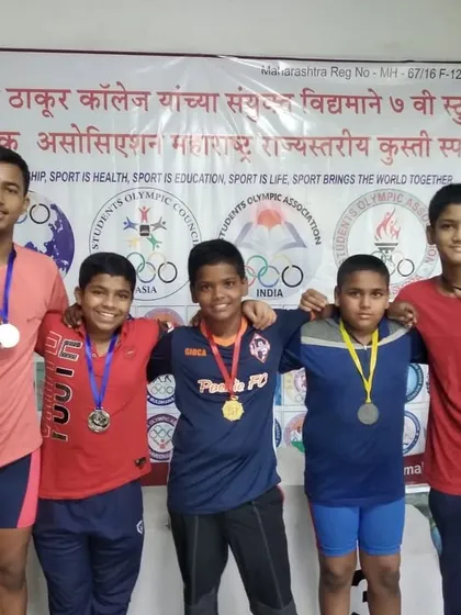 Our five medalists from the 7th Maharashtra State Students Olympic wrestling competition. Their success, including a gold medal for Vikas Narale, is a testament to their hard work and our coaching.