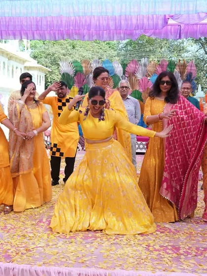 Getting the ladies of the family to let loose and dance their hearts out during a daytime Haldi function. My goal is to make sure everyone feels like part of the celebration.