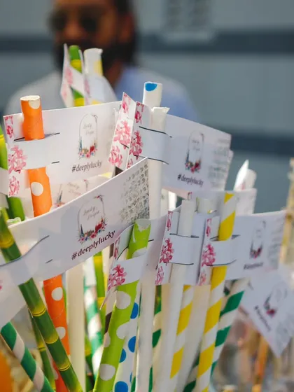 Colorful straws with personalized tags. It's a small detail, but it shows the level of care and customization we bring to every event.