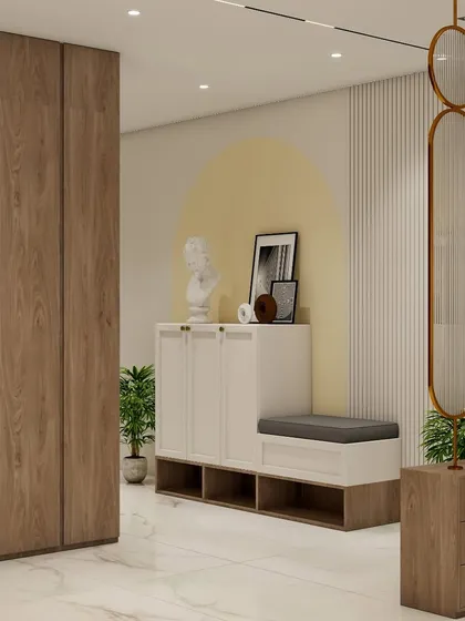 A render of the entryway for the same project, showing a minimalist shoe cabinet with a seating nook and a decorative partition. The design focuses on creating a welcoming and functional first impression.