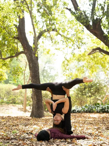 A slight variation of the inverted straddle, demonstrating the subtle adjustments that change the pose.