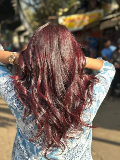 The back view of this cherry red global color, showing off its shine and richness in the sunlight.