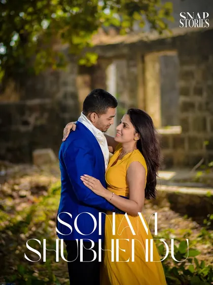 A close-up portrait of a couple sharing a quiet moment in a rustic, natural location. The warm sunlight adds a beautiful glow to this romantic pre-wedding photo.