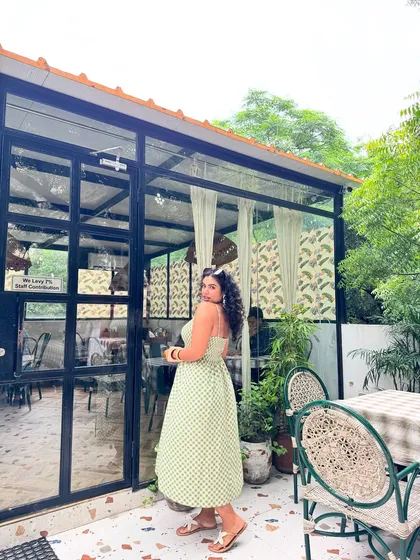 Posing in my favorite sundress. The A-line cut of this dress is super flattering for pear-shaped bodies like mine.