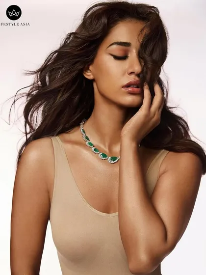 A powerful shot from the Lifestyle Asia cover story with Disha Patani. The makeup here was focused on a strong winged liner and glowing skin, paired with voluminous hair to create a truly glamorous editorial look.