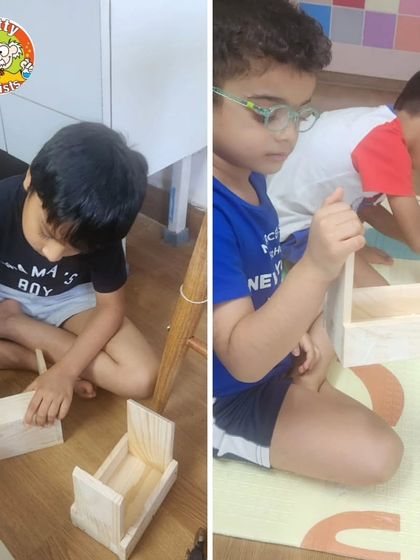 Two young carpenters focused on their projects. These workshops teach patience, precision, and the satisfaction of building something with your own two hands.