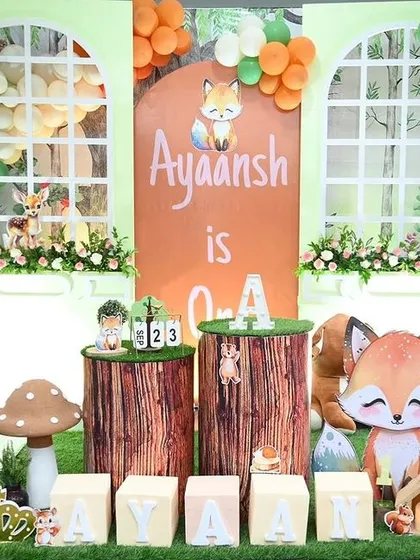 We had so much fun creating this enchanting woodland wonderland for little Ayaansh's first birthday. This fully immersive setup features a custom backdrop, balloon garlands in earthy tones, and adorable forest animal cutouts to bring the magical scene to life for a memorable first birthday party.