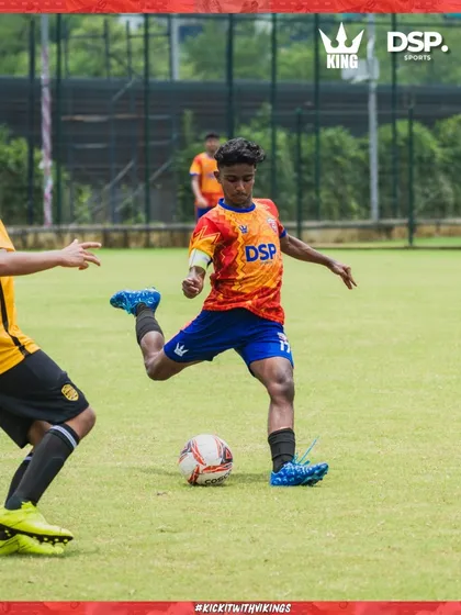 A player takes a powerful shot on goal. We train our players to be decisive in the final third.