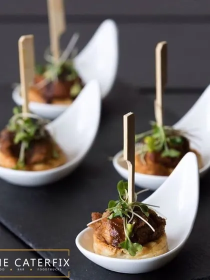 A bite-sized serving of my chilli chicken, presented on a crisp base and garnished with microgreens. This is one of my popular Pan-Asian appetisers, perfect for adding an international flair to your menu.