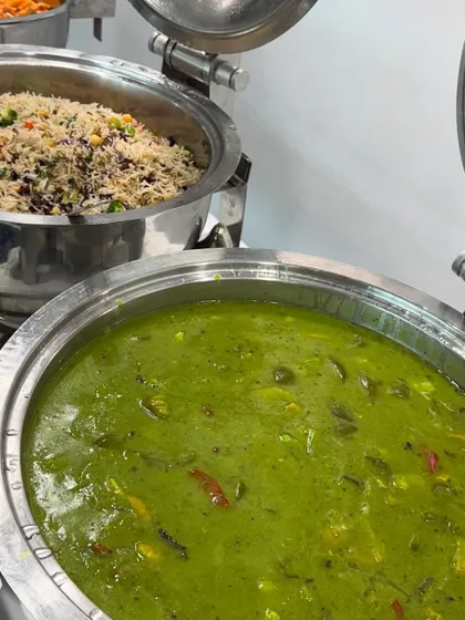 A snapshot from a boardroom lunch for HDFC Life, featuring our authentic Green Thai Vegetable Curry and flavorful Mexican Rice. We offer diverse international cuisines for corporate menus.