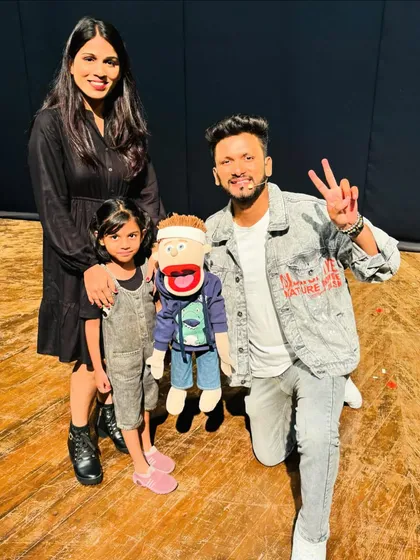 A mother and her daughter posing with us after the show. It's great to see families enjoying the art of puppetry.