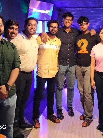 A group of friends posing together at our bowling alley.