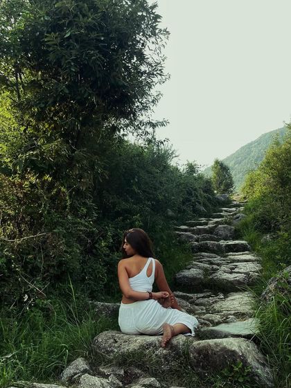 Finding my ground on a stone path in the mountains. The raw, untouched beauty of the Himalayas is a constant source of inspiration and a reminder of our own resilience.