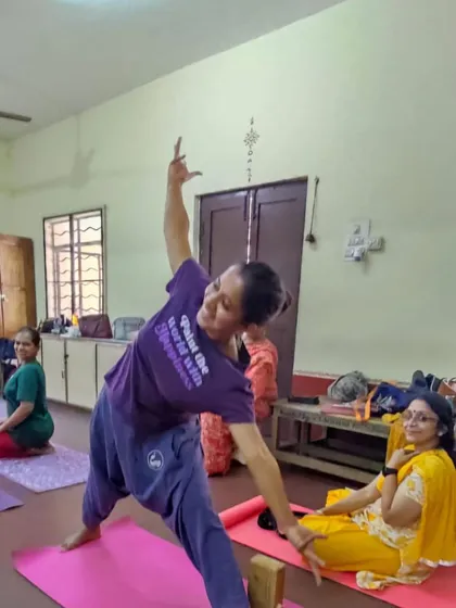 A student practicing Trikonasana.