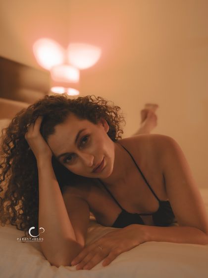 A relaxed and confident pose in a private setting. This fine art portrait is about celebrating natural beauty and the quiet confidence found in solitude.