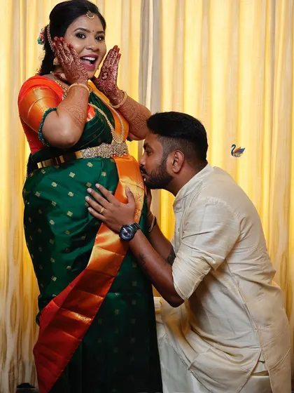 A classic and emotional moment from a maternity shoot. The partner's loving gesture towards the baby bump is a powerful image of shared excitement and love that I always feel privileged to capture.