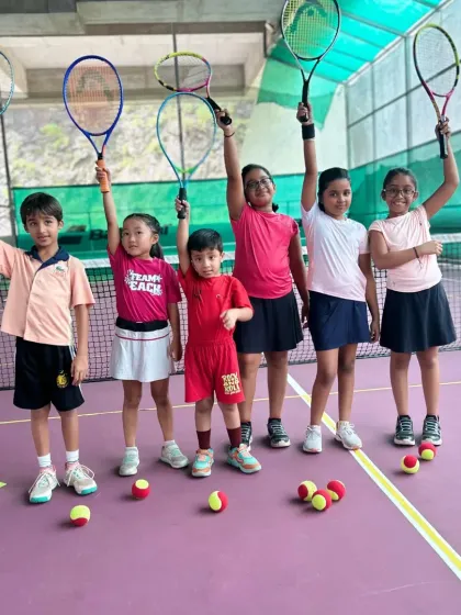 Our future champions from the Red Batch lighting up the court at Off The Mark. We believe in starting young and making tennis a fun, positive experience right from the first swing.