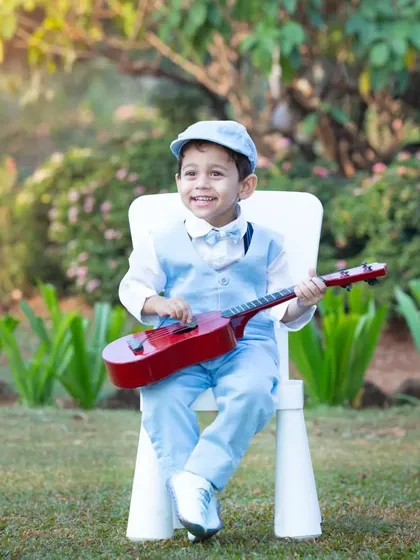 Meet the budding musician. My themed photoshoots are all about sparking imagination and fun. This little gentleman, dressed in his best, was a natural star during his third birthday session.