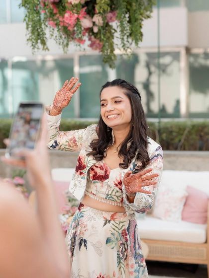 A fun, candid shot of the bride. Her makeup is designed to look great in every photo, capturing all the joy of the day.