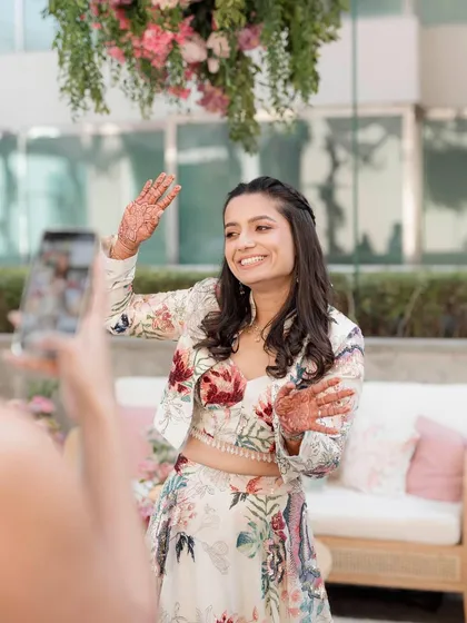 A fun, candid shot of the bride. Her makeup is designed to look great in every photo, capturing all the joy of the day.