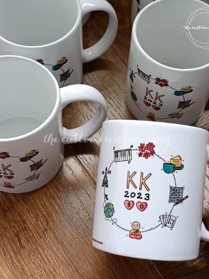 Sip in style with our fully customized monogram mugs. This unique design features a custom logo with meaningful icons surrounding the initials, creating a truly personal keepsake.