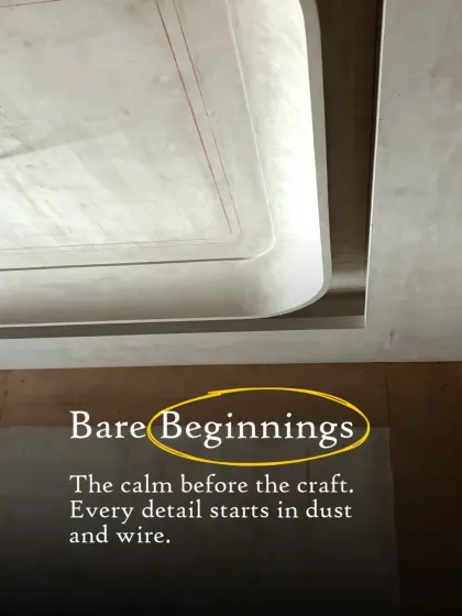 We call this stage 'Bare Beginnings'. It's the calm before the craft, where every detail starts in dust and wire. This image shows the raw structure of a ceiling, holding the promise of the finished product.