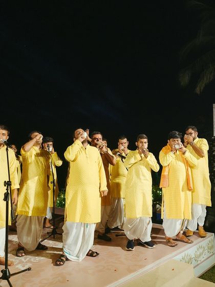 A unique and fun performance by the men of the family, using conch shells as props. We love incorporating creative ideas into family acts.