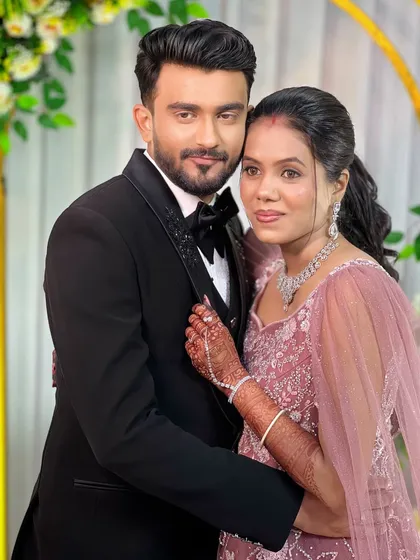 The couple at their reception, looking absolutely perfect together.