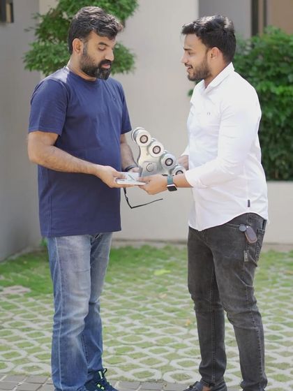 Here, I'm showing Ebadu Rahman the innovative trackless cantilever system. His evaluation and feedback are invaluable as we continue to lead in gate automation.