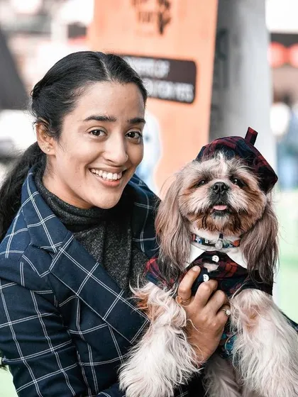 This Shih Tzu was dressed to impress in a matching plaid outfit with his mom. It’s so fun to see the creative and loving ways people celebrate their pets, and I make sure to capture every stylish detail.