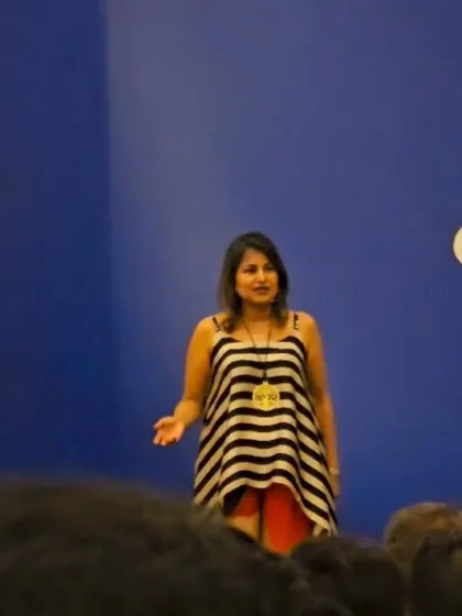 Engaging with the audience during a corporate speaking event. I believe that laughter is a powerful tool for learning and team bonding, and I incorporate it into every talk I give.