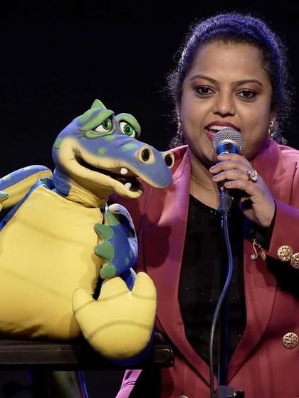 On stage at NMACC with my dragon puppet. I created this show specially for kids, filled with moral stories, humor, and a peek into how ventriloquism works.