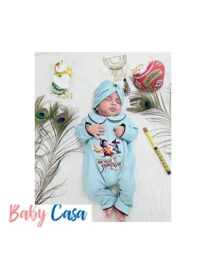 This baby is ready for his first Janmashtami in a sky blue romper. The print says "Mera Pehla Janmashtami" and features a sweet illustration of Krishna, making it a perfect keepsake.